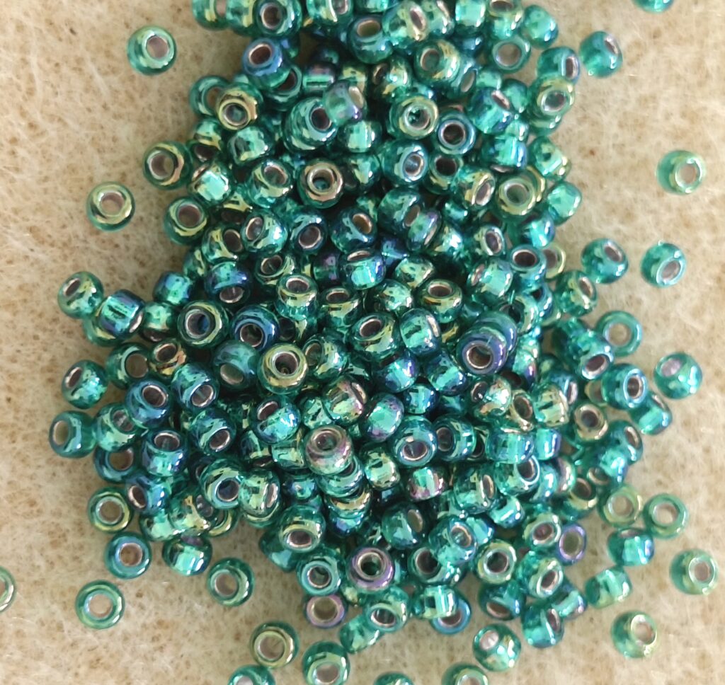 Miyuki Round Rocailles 11/0 Ιαπωνικές χάντρες MR11/ Silverlined Emerald AB