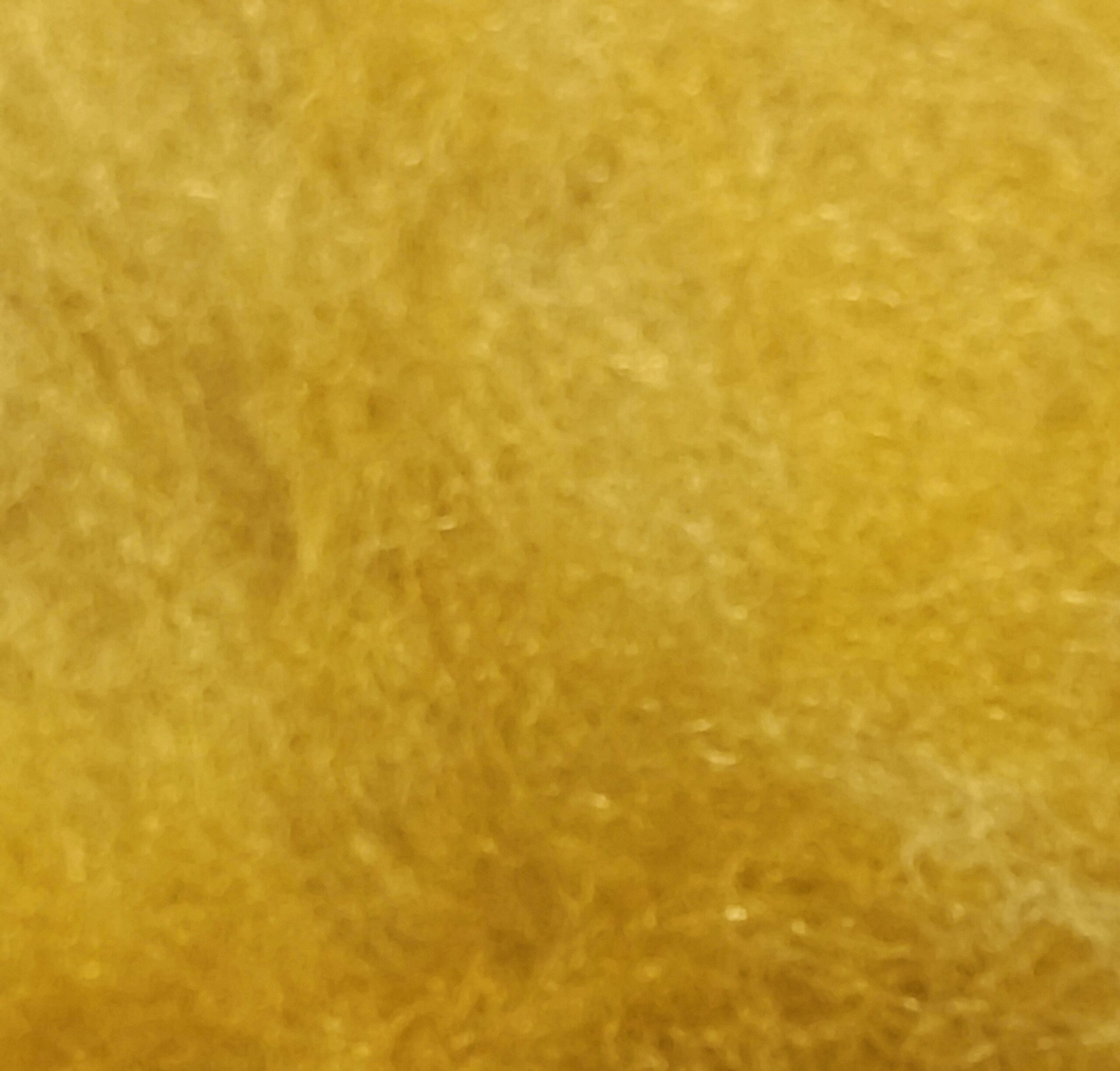 Μη λαναρισμένο μαλλί Merino για Needle Felting 10 g σε φωτεινό κίτρινο χρώμα.