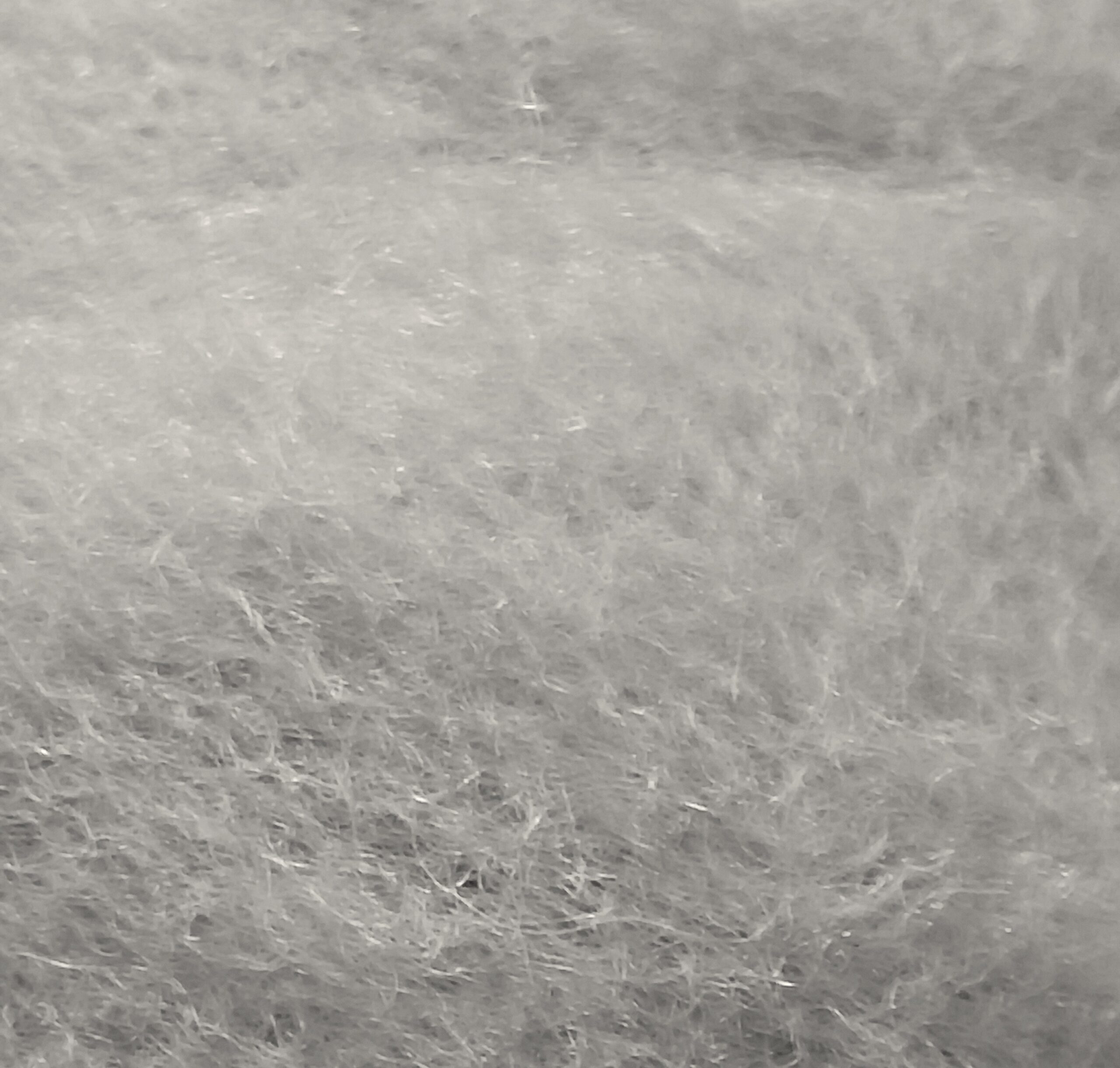 Λαναρισμένο μαλλί Merino για Needle Felting 5 g σε ανοιχτό γκρι χρώμα, λεπτομέρεια υφής